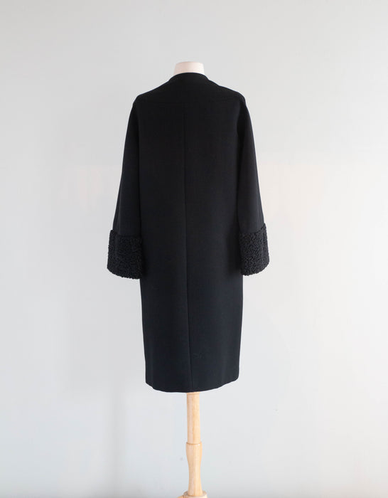 Elegant 1960's Black Wool Balenciaga Influenced Cocoon Coat With Fur Trim / M