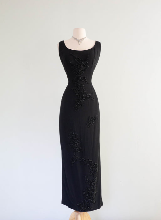 Dramatic 1960's Black Hourglass Evening Dress With Beading and Slit / Medium