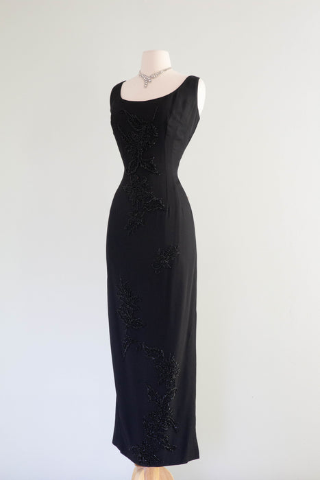 Dramatic 1960's Black Hourglass Evening Dress With Beading and Slit / Medium