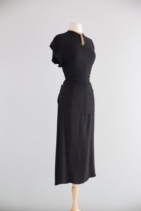 Elegant 1940's Black Rayon Cocktail Dress With Tie Back Peplum / SM