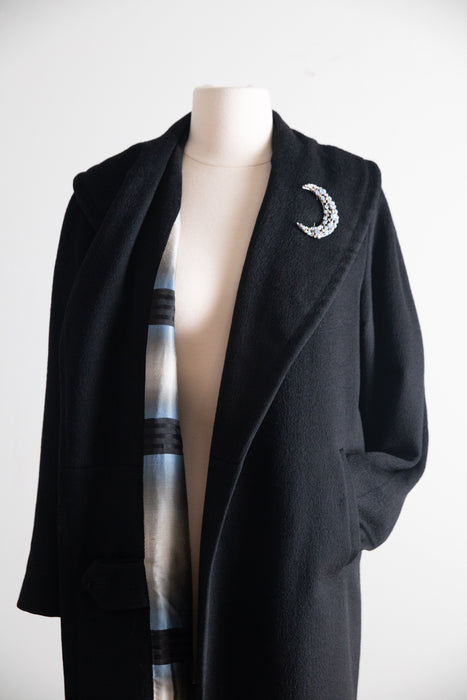 Sublime 1950s Black Virgin Wool Cocoon Coat with Dramatic Striped Lining. / M
