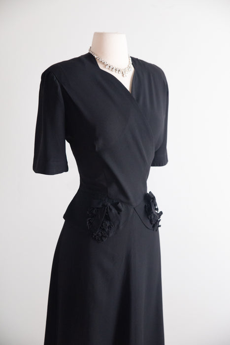 Elegant 1940s Black Rayon Crepe Wrap-Front Dress with Peplum & Bows / ML