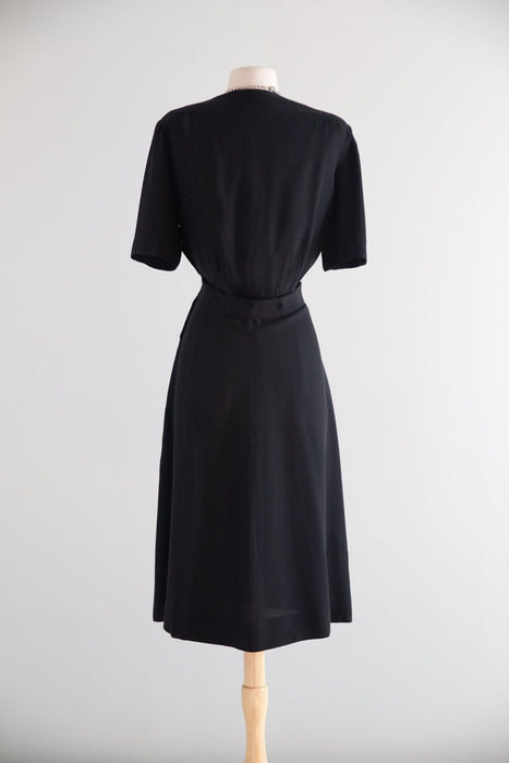 Elegant 1940s Black Rayon Crepe Wrap-Front Dress with Peplum & Bows / ML