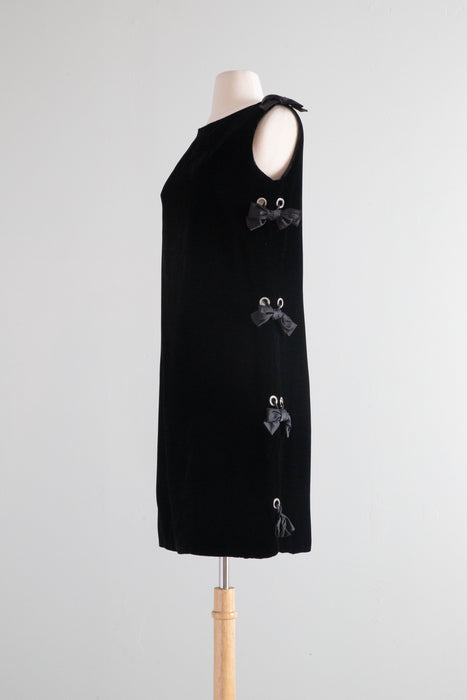 Fabulous 1960's Black Velvet Shift Dress With Rhinestone Grommet Sides and Bows / Medium