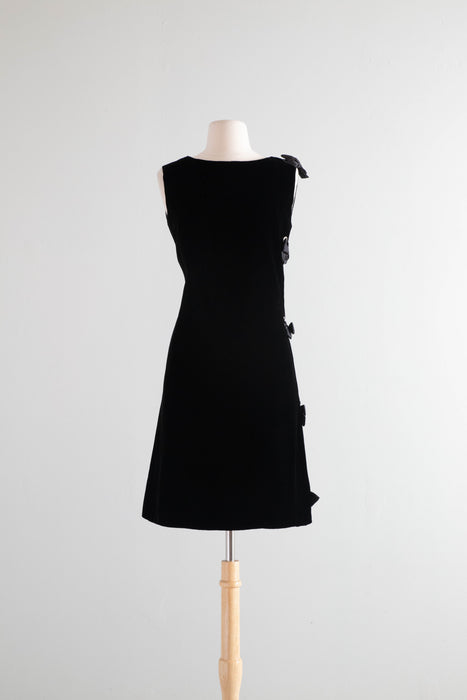 Fabulous 1960's Black Velvet Shift Dress With Rhinestone Grommet Sides and Bows / Medium