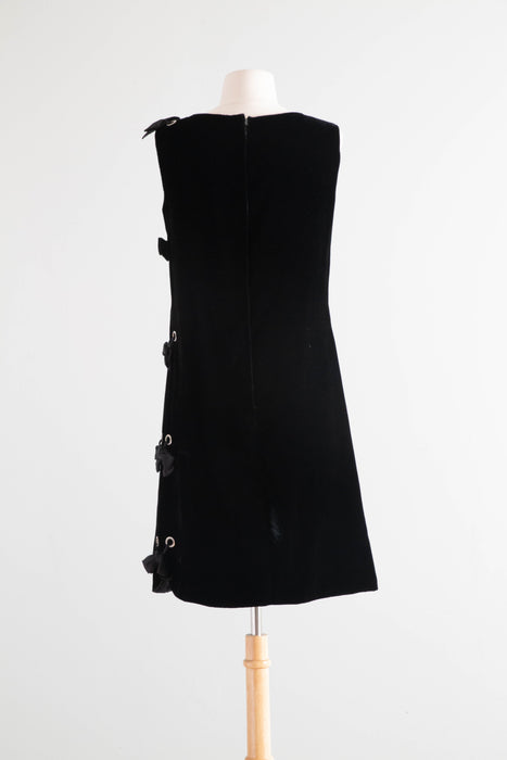 Fabulous 1960's Black Velvet Shift Dress With Rhinestone Grommet Sides and Bows / Medium