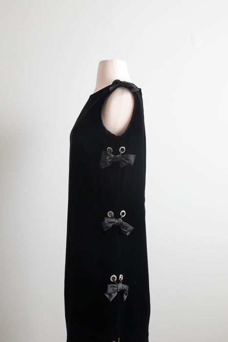 Fabulous 1960's Black Velvet Shift Dress With Rhinestone Grommet Sides and Bows / Medium