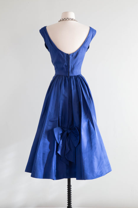 Divine 1950's Sapphire Blue Silk Cocktail Dress With Flared Back / XS