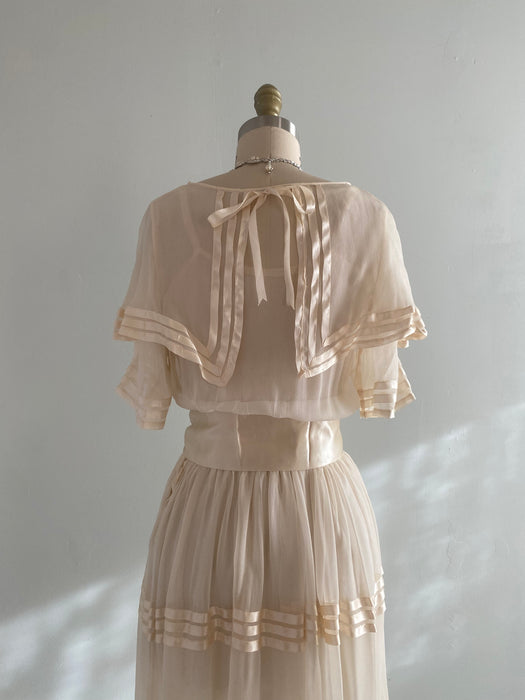1920s silk chiffon dress Chiffon 1920s day dress in light blue print with tiered skirt