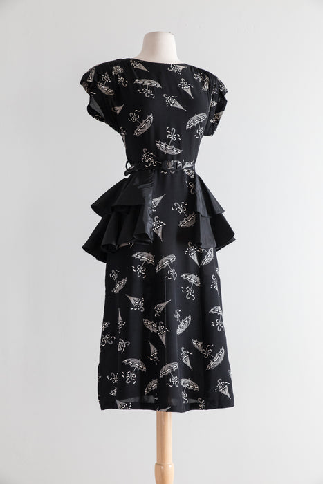 1940's Umbrella Print Black Rayon Cocktail Dress With Taffeta Peplum / Waist 27"