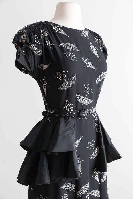 1940's Umbrella Print Black Rayon Cocktail Dress With Taffeta Peplum / Waist 27"