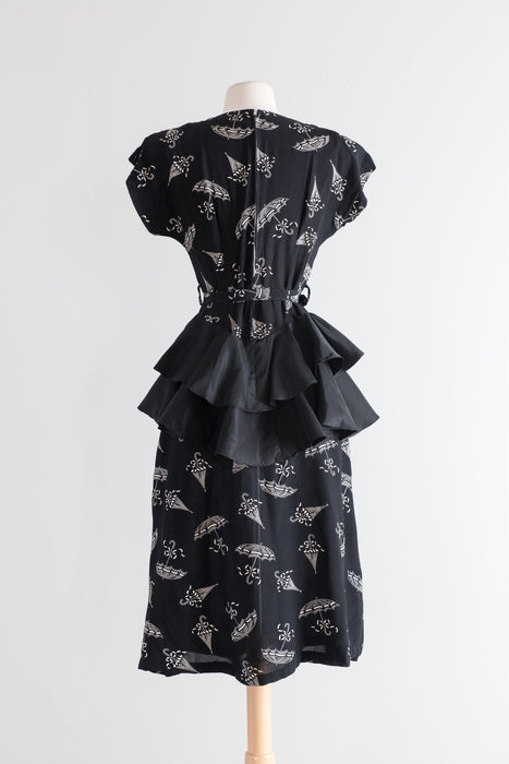 1940's Umbrella Print Black Rayon Cocktail Dress With Taffeta Peplum / Waist 27"