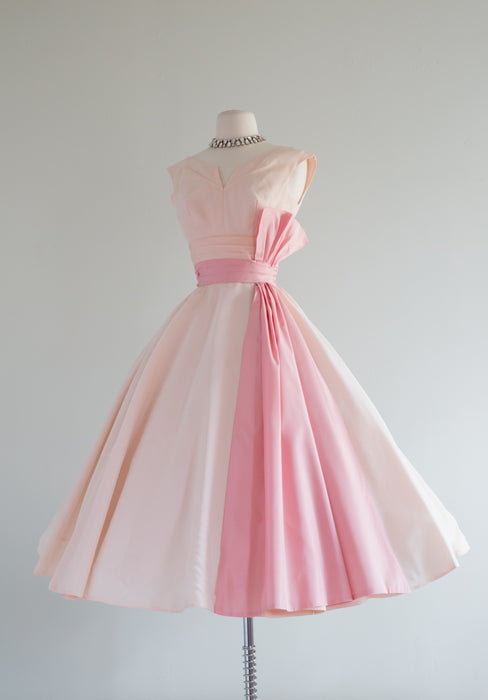 Pretty in Pink 1950's Party Dress With Full Skirt and Pink Sash / Waist 24