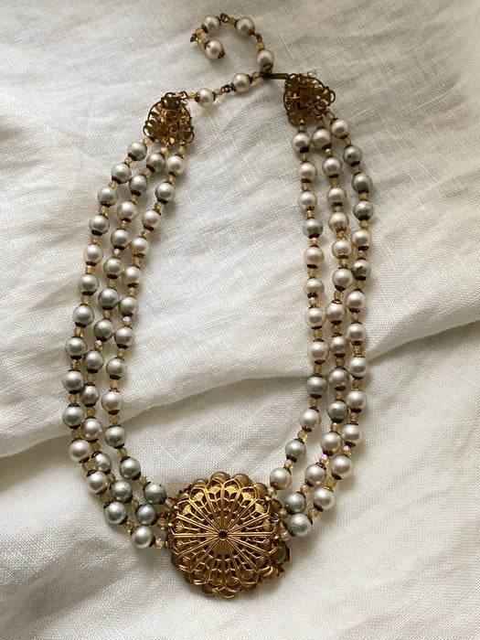 Vintage 1950's Baroque Pearl Triple Strand Necklace With Emerald Center